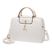 Load image into Gallery viewer, PURSE WITH ANIMAL BUCKLE DESIGN