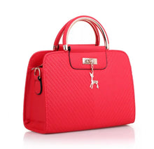 Load image into Gallery viewer, PURSE WITH ANIMAL BUCKLE DESIGN