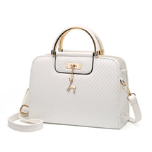 Load image into Gallery viewer, PURSE WITH ANIMAL BUCKLE DESIGN
