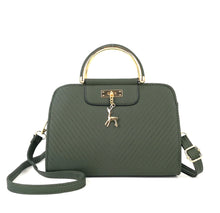 Load image into Gallery viewer, PURSE WITH ANIMAL BUCKLE DESIGN

